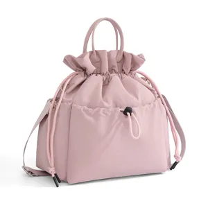 Pink drawstring tote bag, cute shoulder handbag and casual lunch bag for women daily commute.