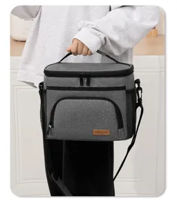 Grey insulated lunch cooler bag with shoulder strap, thermal lunch box for work and school.