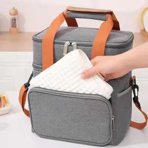 Insulated lunch bag cooler thermal food delivery picnic bag with orange straps and pockets.