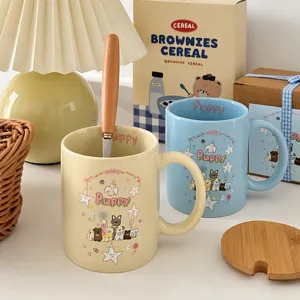 Close-up detail of cute ceramic couple mugs with adorable puppy print, cozy lifestyle setting.