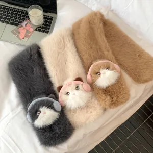 Plush cat scarf detail featuring soft furry texture and cute animal design for winter wear.