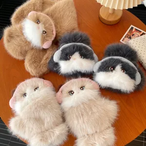 Detailed shot of cute cat plush winter gloves and warm scarf set, soft fluffy material.