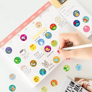 Detail view of cute cartoon animal reward stickers on planner calendar, great for kids class