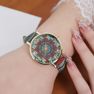 Bohemian vintage women quartz watch with ethnic mandala dial and colorful fabric canvas strap.