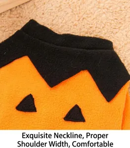 Close-up detail of Halloween pet costume, soft orange and black fleece fabric, comfortable fit.