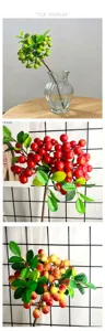 Artificial berry branch detail showcasing vibrant green, red, and yellow faux fruit floral decor.