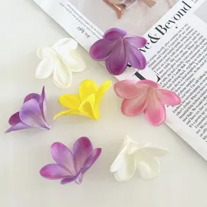 Artificial PU plumeria flower heads for DIY hair accessories, wedding and beach party decor.