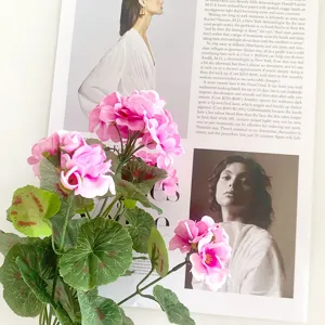 Artificial pink silk geranium flowers for home wedding decor and floral arrangement styling.