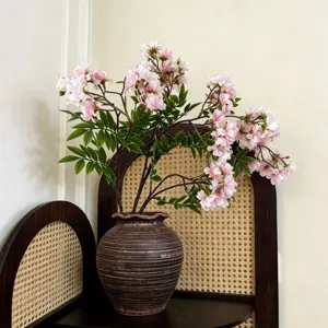 Fiori artificiali di michelia di alta qualità in vaso marrone per decorazione nozze.