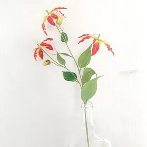 Artificial gloriosa lily flower bouquet detail view for home wedding decor and photography setup.