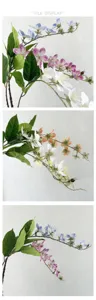 Artificial flower branch detail view showcasing vibrant colors and realistic petal textures.