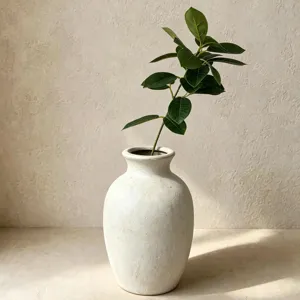 Artificial plant green coral leaf in white ceramic vase for home decoration display