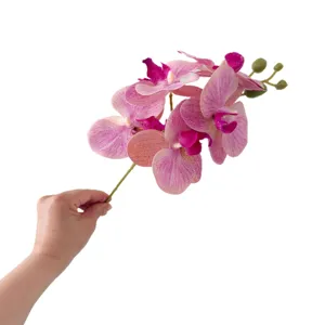 Kunstmatige mini Phalaenopsis orchidee bloem tak roze nep bloemig voor thuisdecoratie.