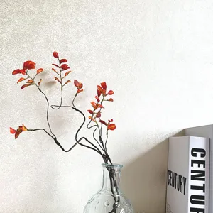 Kunstmatige herfstbladeren takken nepplant decoratie voor hotel en restaurant tafel.