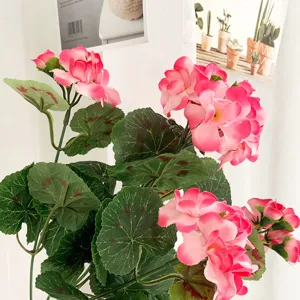 Artificial pink geranium flower detail shot, perfect for home decor, floral arrangement.