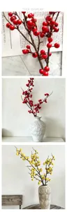 Artificial berry branch detail, realistic red and yellow fruit for home and holiday decor.