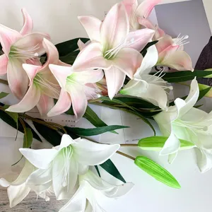 Artificial lily flower bouquet detail, moisturizing touch fake flowers for home wedding decor.