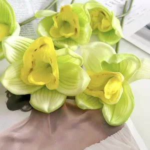 Nuovo stelo di fiore di orchidea PU artificiale europeo per decorazione casa e set foto.