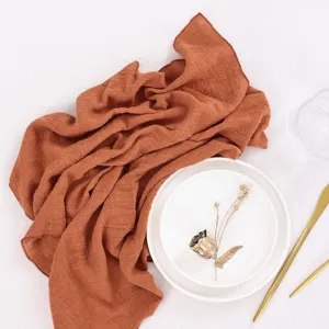 Rust brown wrinkled cloth napkin for wedding party table decoration and home dining setup.