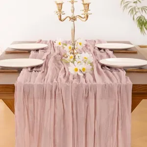 Dusty pink cheesecloth table runner for wedding party rustic dining table decoration detail view