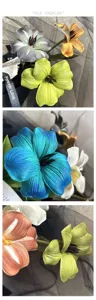 Dettagli in primo piano di fiori di tulipani artificiali vintage in PU multicolore.
