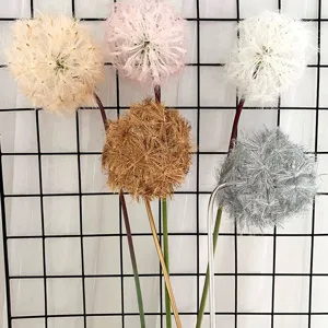 Artificial dandelion flower detail shot, decorative floral arrangement for home and wedding decor.