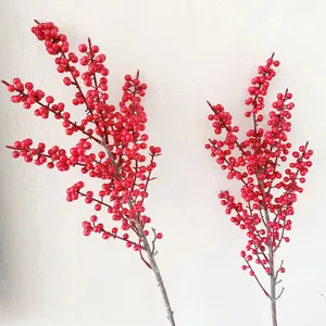 Artificial red berry branch detail, realistic winterberry floral decor for home interior display.