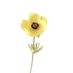 Artificial yellow anemone single stem flower for home decor, table arrangement and photography.