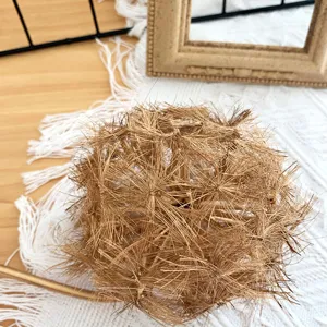 Detailed shot of artificial dandelion flower head, perfect for home decor, wedding and floral arrangements.