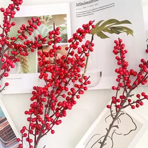 Detailed view of artificial red berry branches, perfect for home decor, floral arrangement, and vase.