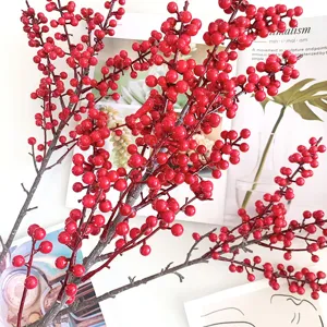 Artificial red berry branches, realistic winter holly floral arrangement for home decor.