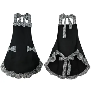 Black ruffled kitchen apron detail, cute princess style with cute bows and pockets.