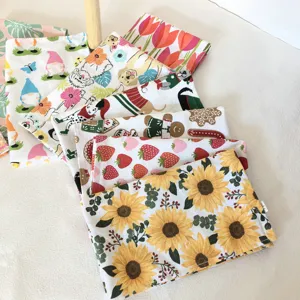 Detailed view of cute printed cotton kitchen dish towels, absorbent tea and hand towel set.