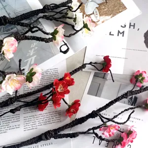 Artificial plum blossom silk flower branch home decor Chinese style floral arrangement detail shot