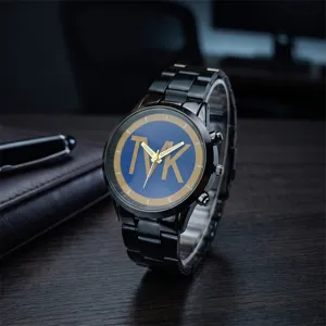 Quartz men watch with blue dial, gold TVK logo and black metal strap detail view.