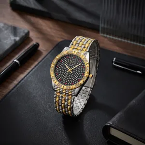 Quartz watch with two-tone steel strap, starry rhinestone dial and crystal bezel details.