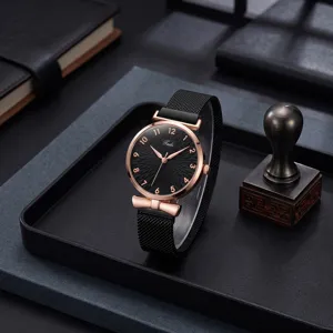 Elegant women's quartz watch with black sunburst dial, rose gold case, and magnetic mesh strap.