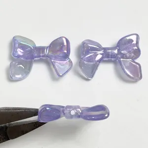Lila schimmernde Schleifenperlen, laserglänzende DIY Schmuckaccessoires für handgemachte Armbänder.