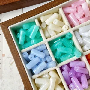 Abalorios sueltos cilíndricos tipo jade nublado de colores para joyería artesanal DIY.