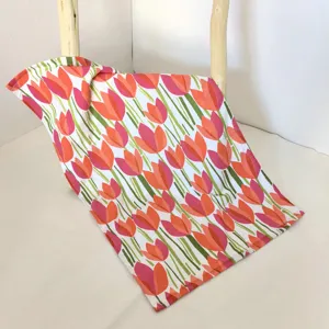 Cotton active printed dish towel tea towel featuring a vibrant red and pink tulip pattern.