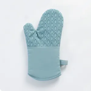 Gant de cuisine en silicone, gros plan sur le gant résistant à chaleur texture antidérapante.