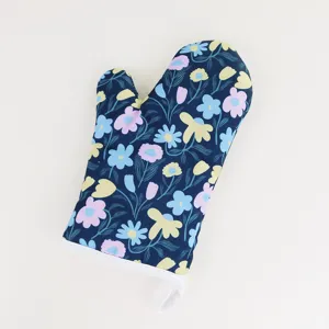 Floral oven mitt for kitchen baking, heat-resistant microwave glove detail view.