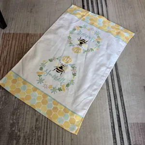 Cotton kitchen dish towel with cute bee and honeycomb pattern, soft and absorbent tea towel.