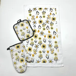 Kitchen oven mitt pot holder and towel set with yellow floral pattern, 3-piece cotton kit.