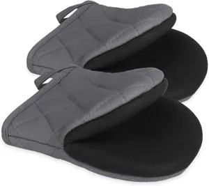 Heat-resistant oven mitts and pot holders set, thick quilted fabric with non-slip silicone grip.