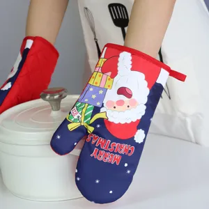 Close-up detail of the Christmas oven mitt featuring Santa print, heat-resistant tool.
