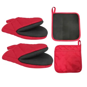 Red and black heat-resistant oven mitts and pot holders set for kitchen baking and cooking.