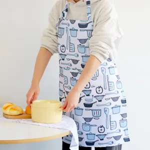 Delantal de cocina impermeable con bonito estampado de utensilios azules para el hogar.