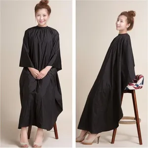 Waterproof salon hair cutting cape gown with snap buttons for barber shop and home use.