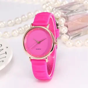 Candy color quartz watch with pink silicone strap and rose gold bezel, simple casual style.